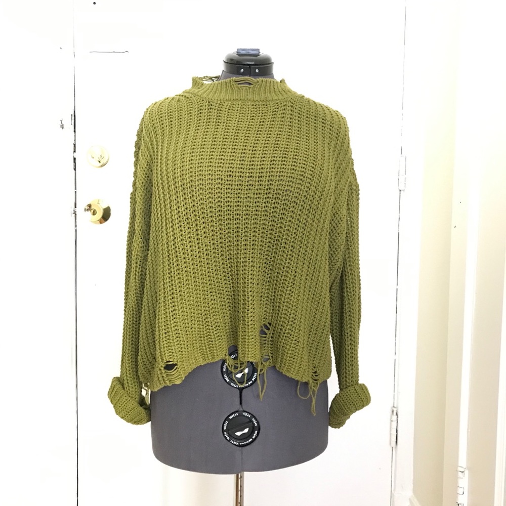 Distressed loose knit sweater